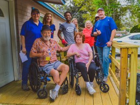 NEFAR members construct wheelchair ramps for housebound amputee and disabled wife 
